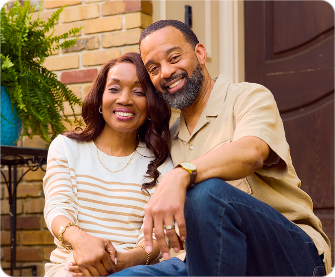 A couple reviewing Medicare enrollment options